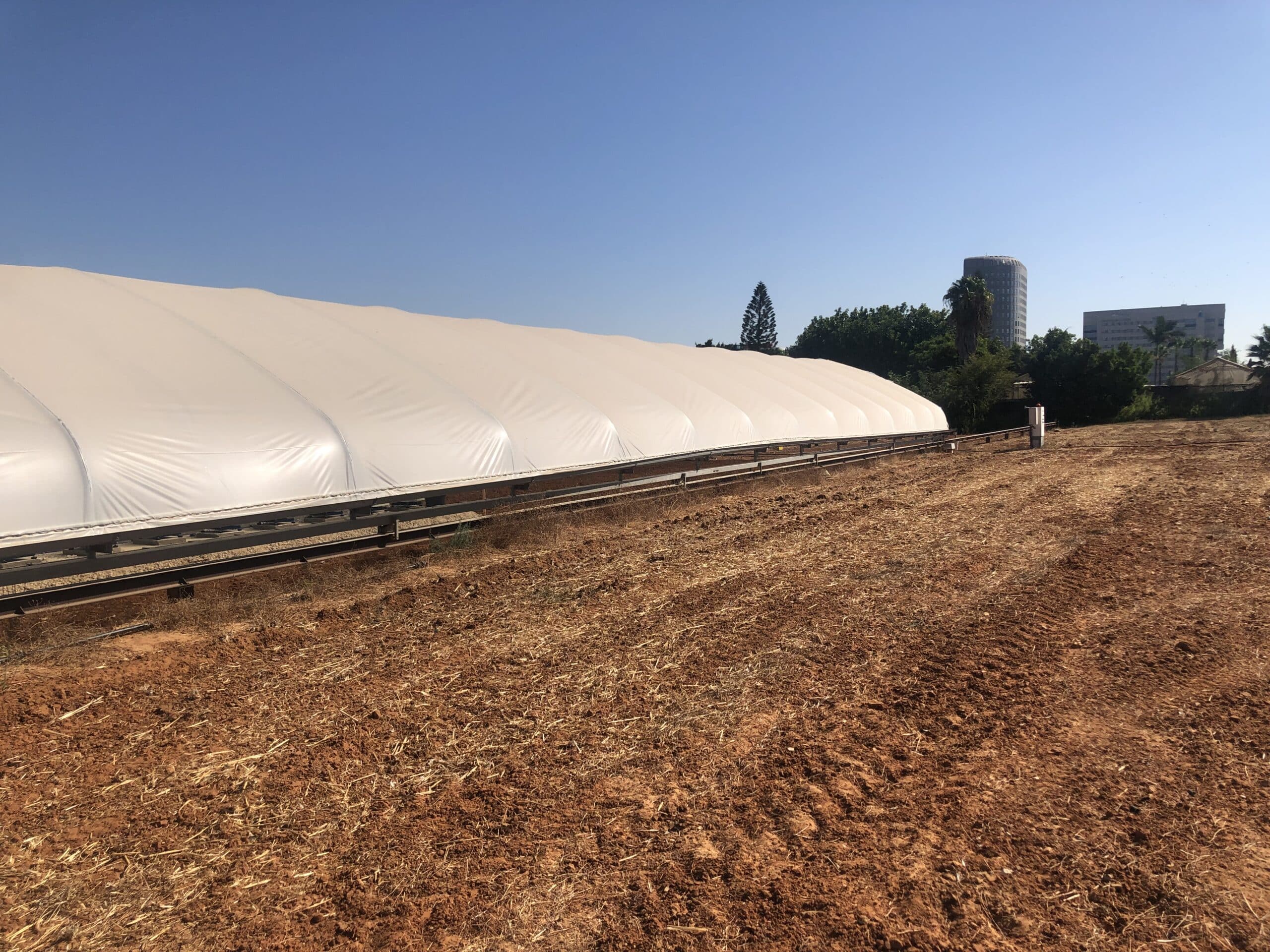 Greenhouse facility exterior for plant stress research